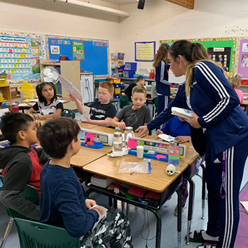 Braell Young volunteering at Vera M. Welsh Elementary School in Lac La Biche