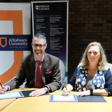 Athabasca University President Dr. Neil Fassina and Portage College President Nancy Broadbent signed a Memorandum of Action Oct. 16 to strengthen the partnership between the two institutions.