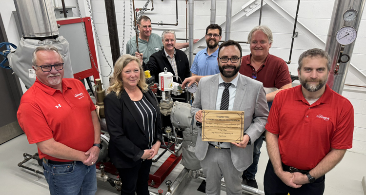 Portage and Flowserve group photo in power engineering lab
