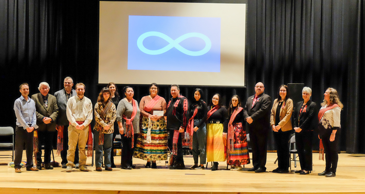 Metis Award winner and presenters on stage