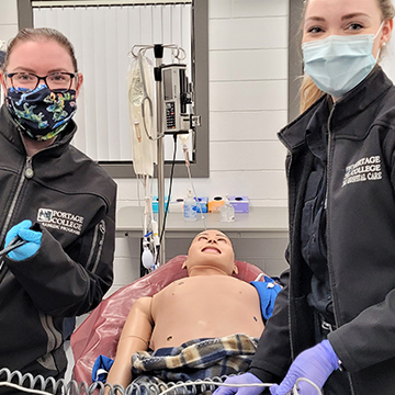 Chrissy and Chelsea Paramedic Students in Class