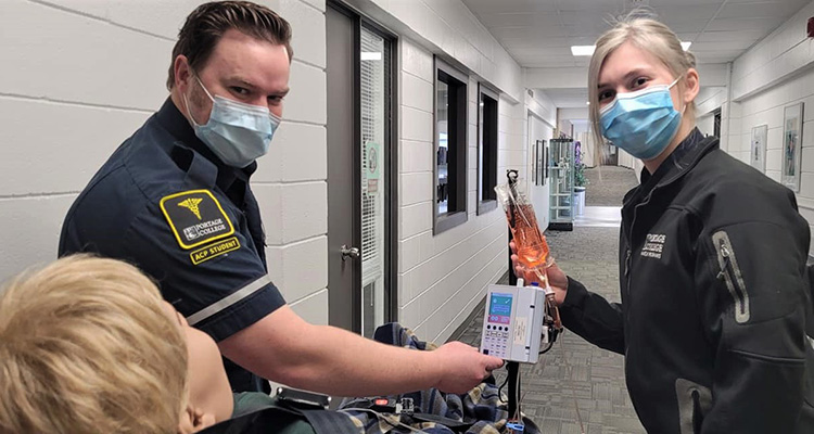 Advanced Care Paramedic students working with pump