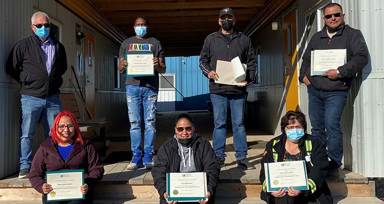 Certificate presentation by Portage to 7 of the Goodfish Lake Business Corporation Business training grads